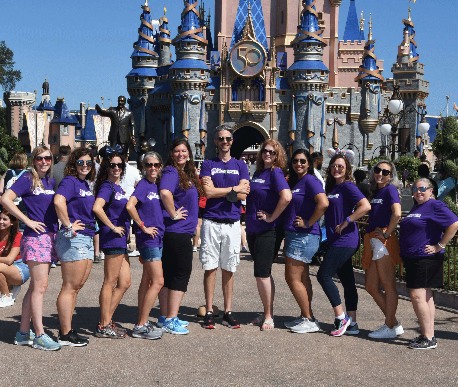 The Vacationeer travel agents in front of the castle at Magic Kingdom